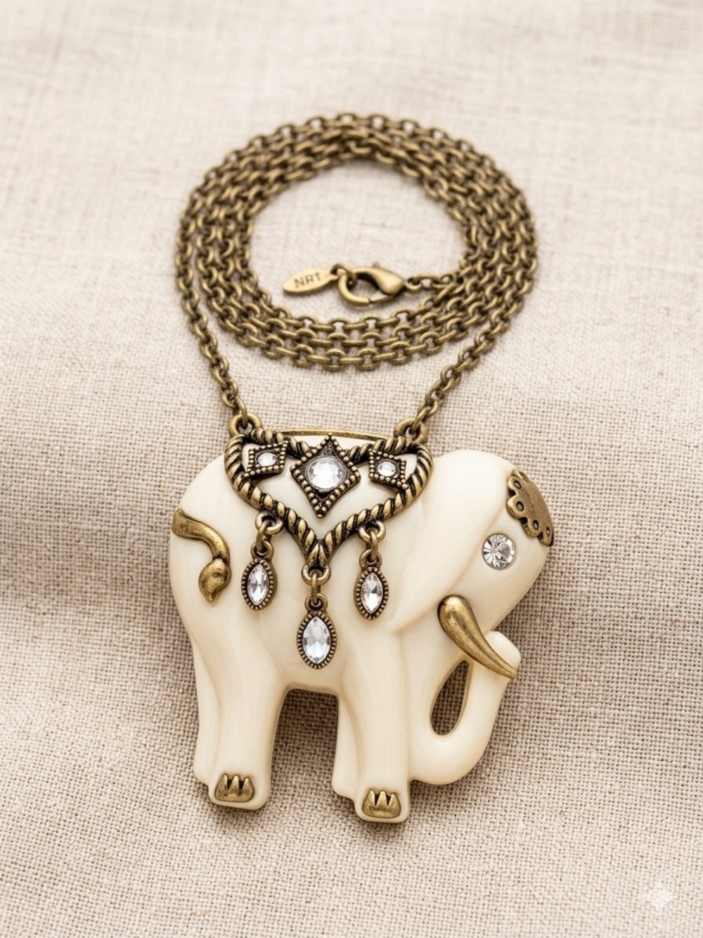 Vintage Avon NRT Lucky White Elephant Pendant Necklace - Faux Ivory Lucite